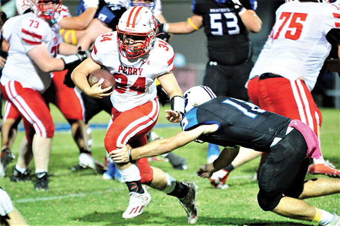 10-5 PCC tyson jenkins tries to make a tackle on eljah gayhaeart.jpg
